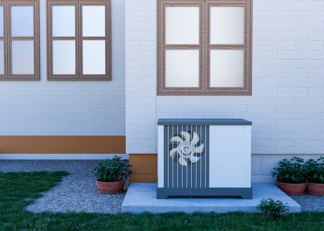 Close-up of heat pump outside home