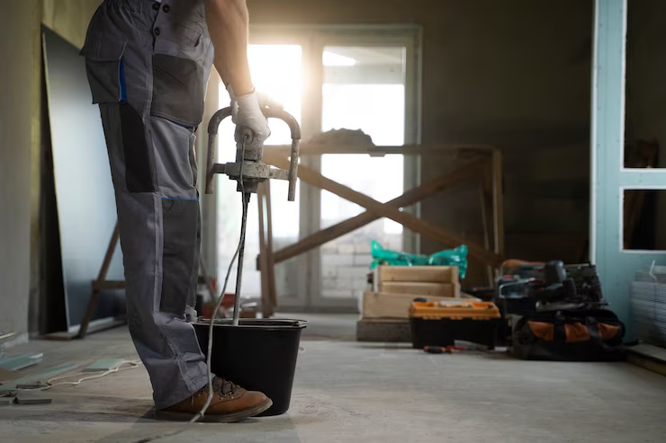 Professional contractor performing home restoration work