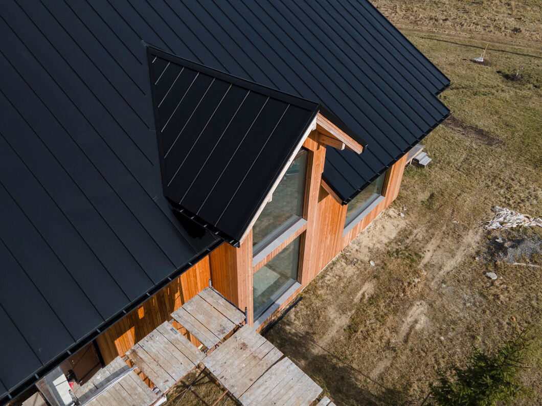 High angle view of a wooden house with a new roof