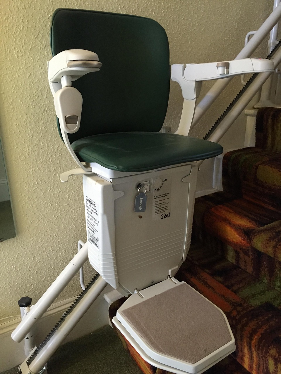 Stair lift installed on a home staircase